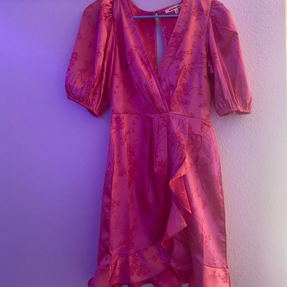 A vibrant hot pink club or party dress